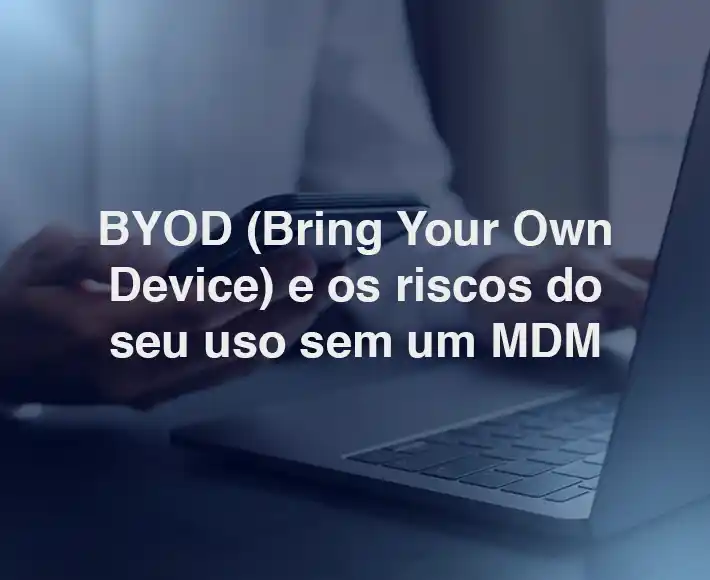 Pessoa usando notebook e celular no ambiente corporativo, representando o conceito BYOD (Bring Your Own Device).
